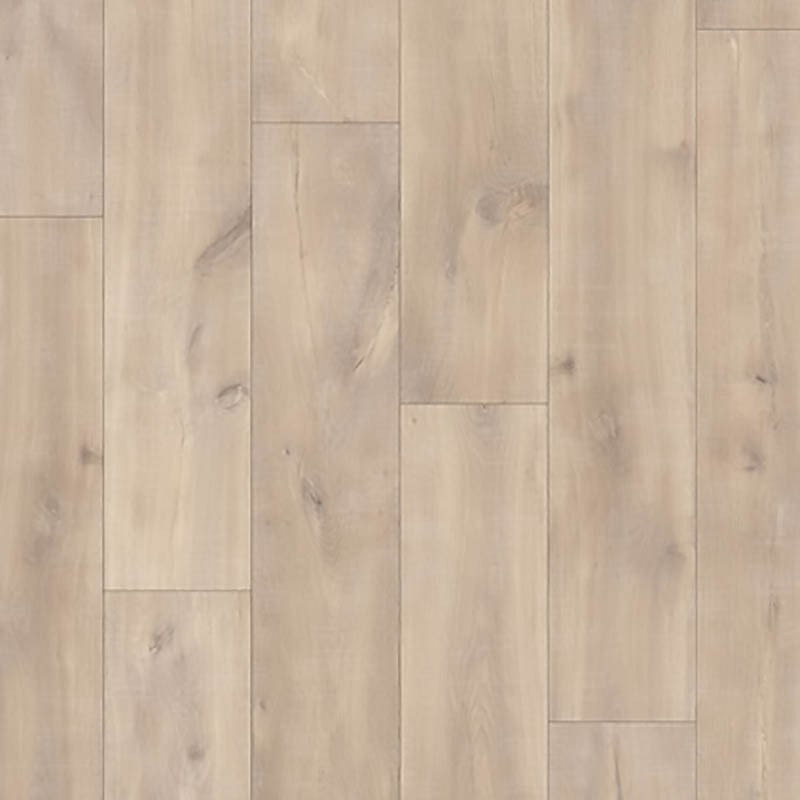 Suelo laminado Quick-Step Roble Havanna Natural con textura de cortes de sierra.