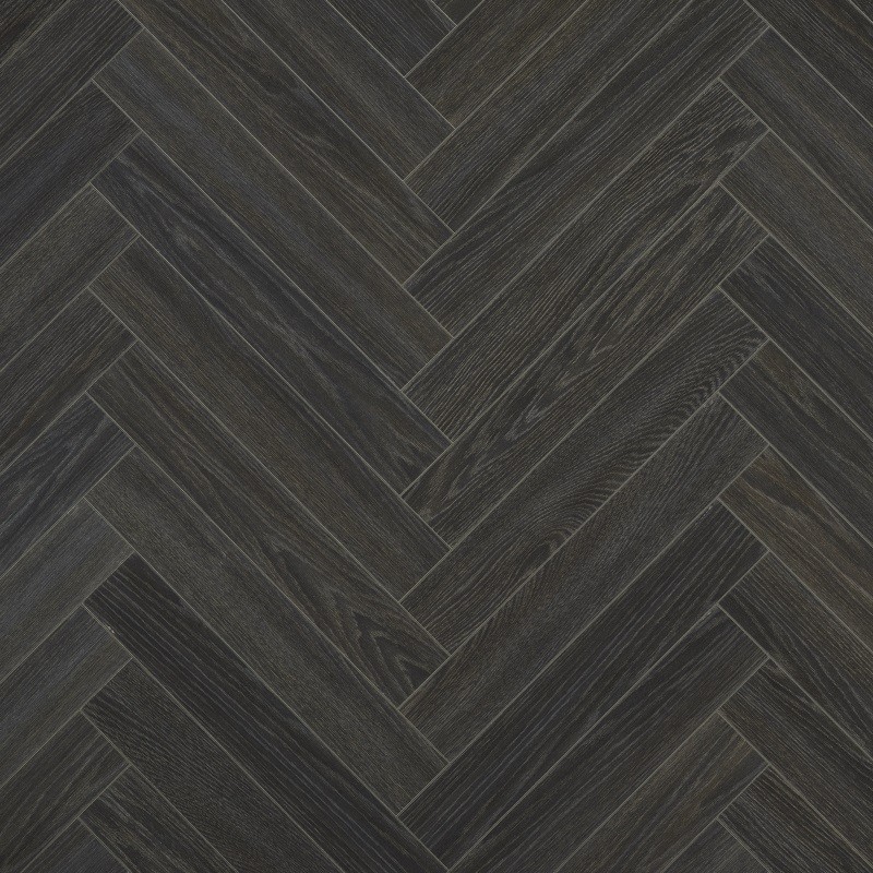Suelo laminado en espiga Berry Alloc Chateau+ Charme Black, diseño elegante en tono negro con acabado madera natural.