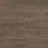 Suelo vinílico efecto madera oscura Lunar Oak en interior contemporáneo y elegante.