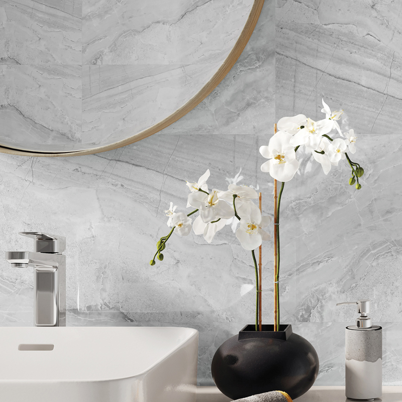 Panel SPC Concrete Dust en gris claro, ideal para interiores contemporáneos con estilo industrial.